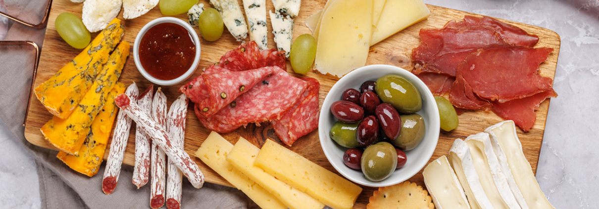 A styled charcuterie or snack board on a dining table