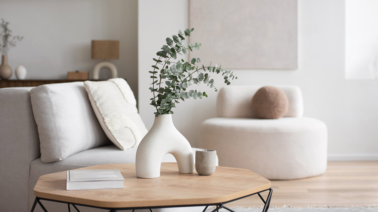 Chair with pillow, coffee table, vase in a living room stock photo